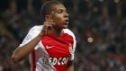 Monaco's forward Kylian MBappe Lottin celebrates his opening goal during the League One soccer match Monaco against Saint Etienne, at the Louis II stadium in Monaco, Wednesday, May 17, 2017. (AP Photo/Claude Paris)