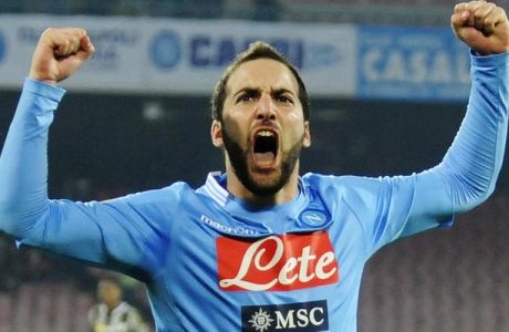 Napoli's Gonzalo Higuain celebrates after scoring during a Serie A soccer match between Napoli and Udinese, at the San Paolo stadium in Naples, Italy, Saturday, Dec. 7, 2013. The match ended 3-3. (AP Photo/Salvatore Laporta)