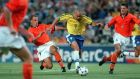 1998 World Cup Finals. Marseille, France. Semi-Final. 7th July, 1998. Brazil 1 v Holland 1.  (Brazil won 4-2 on penalties). Brazil's Ronaldo races away as Holland's Wim Jonk (6) and Ronald De Boer try to intercept.