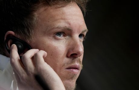 Bayern's head coach Julian Nagelsmann listens to questions of journalists during a news conference in Munich, Germany, Tuesday, March 7, 2023 prior to the Champions League group round of 16 second leg soccer match between Bayern Munich and Paris Saint Germain. Bayern will face PSG on Wednesday, March 8, 2023. (AP Photo/Matthias Schrader)
