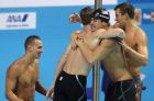 United States' Caeleb Dressel, Kevin Cordes, Nathan Adrian and Matt Grevers, from left, celebrate after winning the gold medal in the men's 4x100-meter medley relay final during the swimming competitions of the World Aquatics Championships in Budapest, Hungary, Sunday, July 30, 2017.