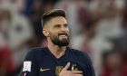 France's Olivier Giroud celebrates scoring his side's first goal during the World Cup round of 16 soccer match between France and Poland, at the Al Thumama Stadium in Doha, Qatar, Sunday, Dec. 4, 2022. (AP Photo/Martin Meissner)
