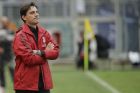 AC Milan coach Vincenzo Montella watches a Serie A soccer match between Lazio and AC Milan, at the Rome Olympic stadium, Sunday, Sept. 10, 2017. (AP Photo/Alessandra Tarantino)