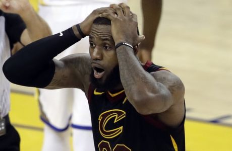 Cleveland Cavaliers forward LeBron James (23) reacts to a call during the second half of Game 1 of basketball's NBA Finals between the Golden State Warriors and the Cavaliers in Oakland, Calif., Thursday, May 31, 2018. (AP Photo/Marcio Jose Sanchez)