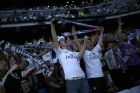 Real Madrid supporters watch on the  big screens placed at the team's Santiago Bernabeu stadium as their team play, during theChampions League final match between Real Madrid and Liverpool being played in Kiev, Ukraine, in Madrid, Saturday, May 26, 2018. (AP Photo/Francisco Seco)
