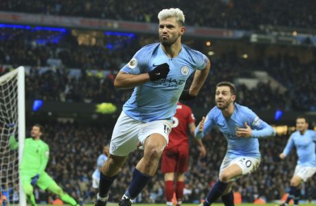 FILE - Manchester City's Sergio Aguero celebrates after scoring the opening goal of the game during their English Premier League soccer match between Manchester City and Liverpool at the Ethiad stadium, Manchester England, Jan. 3, 2019. Barcelona striker Sergio Aguero has on Wednesday, Dec. 15 announced his immediate retirement for health reasons. (AP Photo/Jon Super, file)
