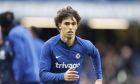 Chelsea's Joao Felix warms up before the English Premier League soccer match between Chelsea and Leeds United at at the Stamford Bridge stadium in London, Saturday, March 4, 2023. (AP Photo/David Cliff)