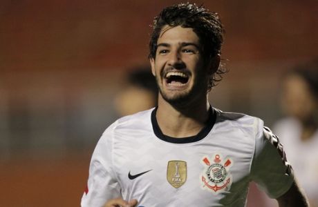 Brazil's Corinthians' Alexandre Pato celebrates after scoring against Colombia's Millonarios during a Copa Libertadores soccer match in Sao Paulo, Brazil, Wednesday, Feb. 27, 2013.  (AP Photo/Andre Penner)
