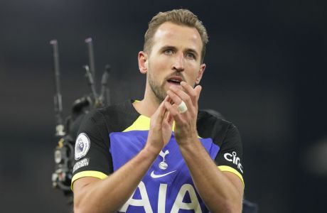 Tottenham's Harry Kane greets supporters after the English Premier League soccer match between Fulham and Tottenham Hotspur at the Craven Cottage Stadium in London, Monday, Jan. 23, 2023. (AP Photo/Frank Augstein)