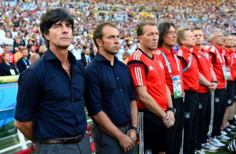 RIO DE JANEIRO, BRAZIL - JULY 13:  Head coach Joachim Loew (1st L) of Germany is seen prior to the 2014 FIFA World Cup Brazil Final match between Germany and Argentina at Maracana on July 13, 2014 in Rio de Janeiro, Brazil.  (Photo by Lars Baron - FIFA/FIFA via Getty Images)