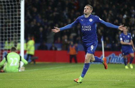 Leicester City's Jamie Vardy, left, celebrates scoring his side's third goal goal during the English Premier League soccer match between Leicester and Liverpool, at the King Power Stadium, in Leicester, England, Monday Feb. 27, 2017. (Nick Potts/PA via AP)
