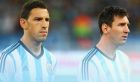 RIO DE JANEIRO, BRAZIL - JUNE 15: Maxi Rodriguez (L) and Lionel Messi of Argentina look on during the National Anthems prior to the 2014 FIFA World Cup Brazil Group F match between Argentina and Bosnia-Herzegovina at Maracana on June 15, 2014 in Rio de Janeiro, Brazil.  (Photo by Ronald Martinez/Getty Images)