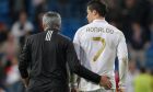 Real Madrid's coach Jose Mourinho from Portugal embraces Cristiano Ronaldo from Portugal after a Champions League round of 16, second leg soccer match against CSKA Moscow's at the Santiago Bernabeu Stadium, in Madrid, Wednesday, March 14, 2012. (AP Photo/Daniel Ochoa de Olza)