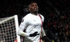 AC Milan's Rafael Leao celebrates after scoring against Rennes during the Europa League soccer match between Rennes and AC Milan at the Roazhon Park stadium in Rennes, western France, Thursday, Feb. 22, 2024. (AP Photo/Mathieu Pattier)