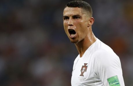 Portugal's Cristiano Ronaldo reacts angry during the round of 16 match between Uruguay and Portugal at the 2018 soccer World Cup at the Fisht Stadium in Sochi, Russia, Saturday, June 30, 2018. (AP Photo/Francisco Seco)