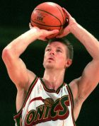German Detlef Schrempf from the Seattle SuperSonics scores a basket during the pre-season NBA game against the Indiana Pacers, Friday night, Oct. 18, 1996 in Berlin.  (AP Photo/Jan Bauer)