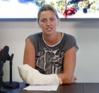 Czech Republic's tennis player Petra Kvitova holds a statement for media in Prague, Czech Republic, Friday, Dec. 23, 2016. Two-time Wimbledon champion was injured Tuesday Dec. 20, 2016 when a knife-wielding intruder attacked her at her home in the town of Prostejov. Kvitova underwent nearly four hour surgery on her left hand. (AP Photo/Petr David Josek)
