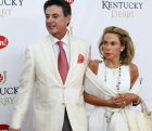 University of Louisville basketball coach Rick Pitino and his wife Joanne arrive for the 137th Kentucky Derby horse race at Churchill Downs Saturday, May 7, 2011, in Louisville, Ky. (AP Photo/Darron Cummings)