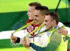 Gold medalist Greece's Eleftherios Petrounias center, silver medallist Brazil's Arthur Zanetti, right, and bronze medallist Russia's Denis Abliazin display their medals for the rings during the artistic gymnastics men's apparatus final at the 2016 Summer Olympics in Rio de Janeiro, Brazil, Monday, Aug. 15, 2016. (AP Photo/Dmitri Lovetsky)