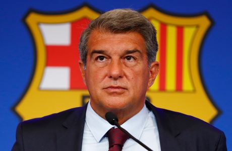 FILE - FC Barcelona club President Joan Laporta pauses during a news conference in Barcelona, Spain, on Aug. 6, 2021. Spanish state prosecutors have formally accused Barcelona soccer club of corruption because of its payments of large sums of money for several years to the vice president of the refereeing committee. The decision has been made official on Friday, March 10, 2023. (AP Photo/Joan Monfort, File)