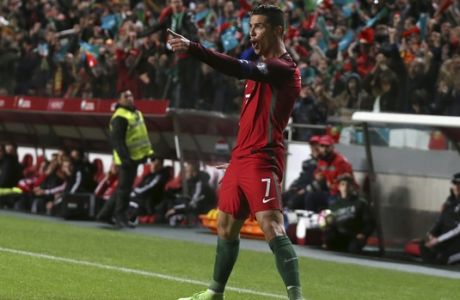 Portugals Cristiano Ronaldo celebrates after scoring his sides second goal during the World Cup Group B qualifying soccer match between Portugal and Hungary at the Luz stadium in Lisbon Saturday, March 25 2017. (AP Photo/Armando Franca)