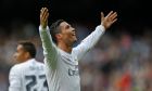 Real Madrid's Cristiano Ronaldo celebrates after scoring a goal against Celta during a Spanish La Liga soccer match between Real Madrid and Celta Vigo at the Santiago Bernabeu stadium in Madrid, Saturday, March 5, 2016. Ronaldo scored four goals in Real Madrid's 7-1 victory.  (AP Photo/Francisco Seco)
