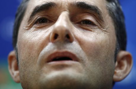 FC Barcelona's coach Ernesto Valverde attends a press conference at the Sports Center FC Barcelona Joan Gamper in Sant Joan Despi, Spain, Tuesday, Oct. 17, 2017. FC Barcelona will play against Olympiacos in a Champions League Group D soccer match on Wednesday. (AP Photo/Manu Fernandez)