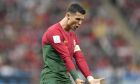 Portugal's Cristiano Ronaldo reacts during the World Cup group H soccer match between Portugal and Uruguay, at the Lusail Stadium in Lusail, Qatar, Monday, Nov. 28, 2022. (AP Photo/Aijaz Rahi)