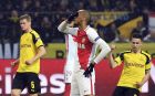 Monaco's Fabinho, center, reacts after he failed to score a penalty goal during the Champions League quarterfinal first leg soccer match between Borussia Dortmund and AS Monaco in Dortmund, Germany, Wednesday, April 12, 2017. (Federico Gambarini/dpa via AP)