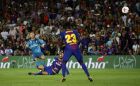 Real Madrid's Cristiano Ronaldo, left, kicks the ball to score during the Spanish Supercup, first leg, soccer match against FC Barcelona at Camp Nou stadium in Barcelona, Spain, Sunday, Aug. 13, 2017. (AP Photo/Manu Fernandez)