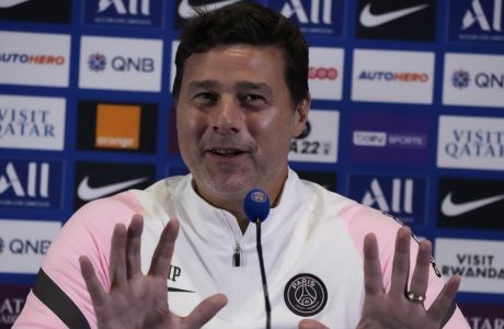 PSG's coach Mauricio Pochettino gestures during a press conference at the Paris Saint-Germain training camp in Saint-Germain-en-Laye, west of Paris, Friday, Aug. 13, 2021. PSG will face Strasbourg Saturday in a League One soccer march. (AP Photo/Francois Mori)