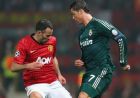 MANCHESTER, ENGLAND - MARCH 05:  Ryan Giggs of Manchester United challenges Cristiano Ronaldo of Real Madrid during the UEFA Champions League Round of 16 Second leg match between Manchester United and Real Madrid at Old Trafford on March 5, 2013 in Manchester, United Kingdom.  (Photo by Alex Livesey/Getty Images)