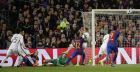PSG's Layvin Kurzawa, center, score an own goal during the Champions League round of 16, second leg soccer match between FC Barcelona and Paris Saint Germain at the Camp Nou stadium in Barcelona, Spain, Wednesday March 8, 2017. (AP Photo/Emilio Morenatti)
