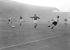 England's Jackie Sewell (r) fires a shot at goal
