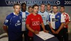 Players, left to right, Phil Neville of Everton, Mario Melchiot of Wigan, Fabio Aurelio of Liverpool, Gary Neville of Manchester United, Richard Dunne of Manchester City, Kevin Nolan of Bolton, David Dunn of Blackburn and Andy Griffen of Stoke, pose for a photograph during the Premeir League Season 2008/2009 launch at the Blackburn Rovers Sports Arena, Blackburn, England, Tuesday Aug. 12, 2008. (AP Photo/Paul Thomas)