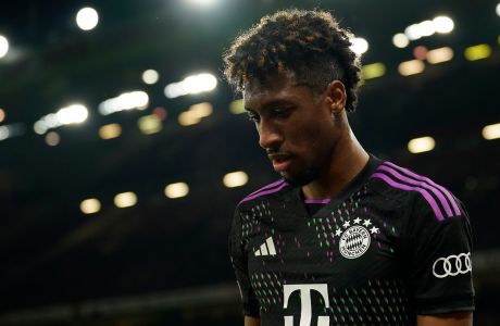 Bayern's Kingsley Coman reacts as he is substituted during the group A Champions League soccer match between Manchester United and Bayern Munich at the Old Trafford stadium in Manchester, England, Tuesday, Dec. 12, 2023. (AP Photo/Dave Thompson)