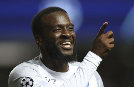 Napoli's Tanguy Ndombele celebrates after scoring his side's third goal during the Champions League group A soccer match between Rangers and Napoli at the Ibrox stadium in Glasgow, Scotland, Wednesday, Sept. 14, 2022. (AP Photo/Scott Heppell)