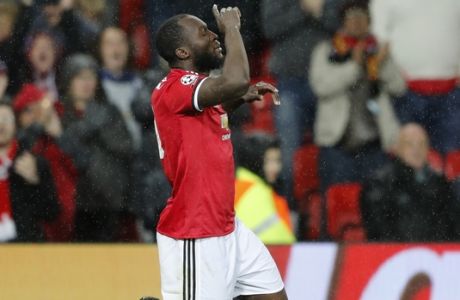 Manchester United's Romelu Lukaku, celebrates his goal during the Champions League group A soccer match between Manchester United and Basel, at the Old Trafford stadium in Manchester, Tuesday, Sept. 12, 2017. (AP Photo/Frank Augstein)