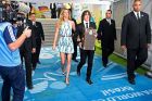 RIO DE JANEIRO, BRAZIL - JULY 13:  Former Spanish international Carles Puyol (R) and model Gisele Bundchen (L) walk in the tunnel to present the World Cup in a Louis Vuitton travel case prior to the 2014 FIFA World Cup Brazil Final match between Germany and Argentina at Maracana on July 13, 2014 in Rio de Janeiro, Brazil.  (Photo by Mike Hewitt - FIFA/FIFA via Getty Images)