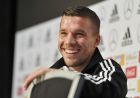 Germany's forward Lukas Podolski smiles during  a press conference prior the friendly soccer match between Germany and England in Dortmund, Germany, Tuesday, March 21, 2017. Podolski will play his last match for the national team against England on Wednesday. (AP Photo/Martin Meissner)