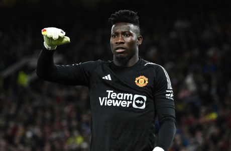Manchester United's Andre Onana during the English Premier League soccer match between Manchester United and Wolverhampton Wanderers at the Old Trafford stadium in Manchester, England, Monday, Aug. 14, 2023. (AP Photo/Rui Vieira)