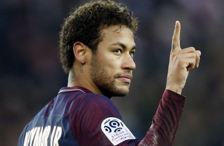 PSG's Neymar gestures during the French League One soccer match between Paris Saint Germain and Montpellier at the Parc des Princes stadium in Paris, Saturday, Jan. 27, 2018. (AP Photo/Christophe Ena)