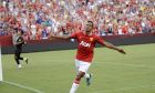 Manchester United's Nani celebrates his goal against FC Barcelona during the first half of a World Football Challenge 2011 soccer game Saturday, July 30, 2011, in Landover, Md. (AP Photo/Nick Wass)