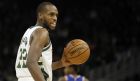 Milwaukee Bucks' Khris Middleton during the second half of an NBA basketball game against the New York Knicks Monday, Oct. 22, 2018, in Milwaukee. (AP Photo/Aaron Gash)