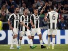 Juventus's Paulo Dybala, second from right, celebrates after scoring his side's second goal during a Champions League, quarterfinal, first-leg soccer match between Juventus and Barcelona, at the Juventus Stadium in Turin, Italy, Tuesday, April 11, 2017. (AP Photo/Antonio Calanni)