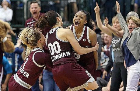 Mar 31, 2017; Dallas, TX, USA; Mississippi State Lady Bulldogs guard Blair Schaefer (1) and guard Dominique Dillingham (00) and guard Morgan William (2) celebrate defeating the Connecticut Huskies in overtime in the semifinals of the women's Final Four at American Airlines Center. Mandatory Credit: Kevin Jairaj-USA TODAY Sports ORG XMIT: USATSI-356636 ORIG FILE ID:  201703031_lbm_aj6_155.JPG