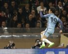 Manchester City's Leroy Sane celebrates his side's first goal during a Champions League round of 16 second leg soccer match between Monaco and Manchester City at the Louis II stadium in Monaco, Wednesday March 15, 2017. (AP Photo/Claude Paris)