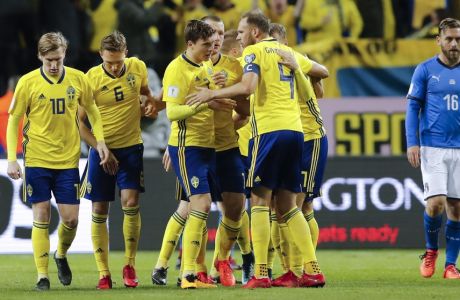 Sweden's players celebrate after Jakob Johansson scored, during the World Cup qualifying play-off first leg soccer match between Sweden and Italy, at the Friends Arena in Stockholm, Friday, Nov. 10, 2017. (AP Photo/Frank Augstein)