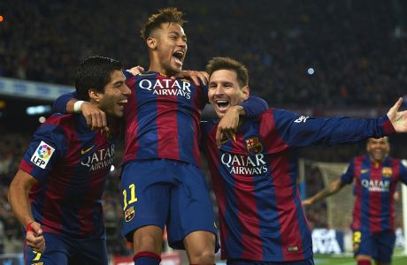 FILE - In this Sunday, Jan. 11, 2015 file photo, FC Barcelona's Lionel Messi, right, Neymar, center, and Luis Suarez, celebrate after scoring against Atletico Madrid during a Spanish La Liga soccer match at the Camp Nou stadium in Barcelona, Spain. Barcelona said, Wednesday, Aug. 2, 2017, Neymar's 222 million euro ($262 million) release clause must be paid in full if the Brazil striker wants to leave. (AP Photo/Siu Wu, File)