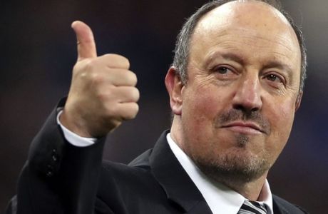 Newcastle United manager Rafael Benitez celebrates promotion after the English Championship soccer match between Newcastle United and Preston, at  St James' Park, in Newcastle, England, Monday April 24, 2017. After one season in the English Championship (second-tier), Newcastle United secured an immediate return to the Premier League by beating Preston North End 4-1 on Monday. (Owen Humphreys/ PA via AP)